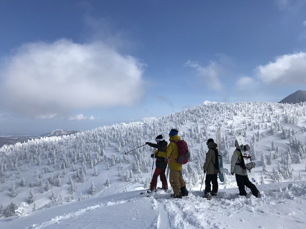 people on snow covered ground during daytime