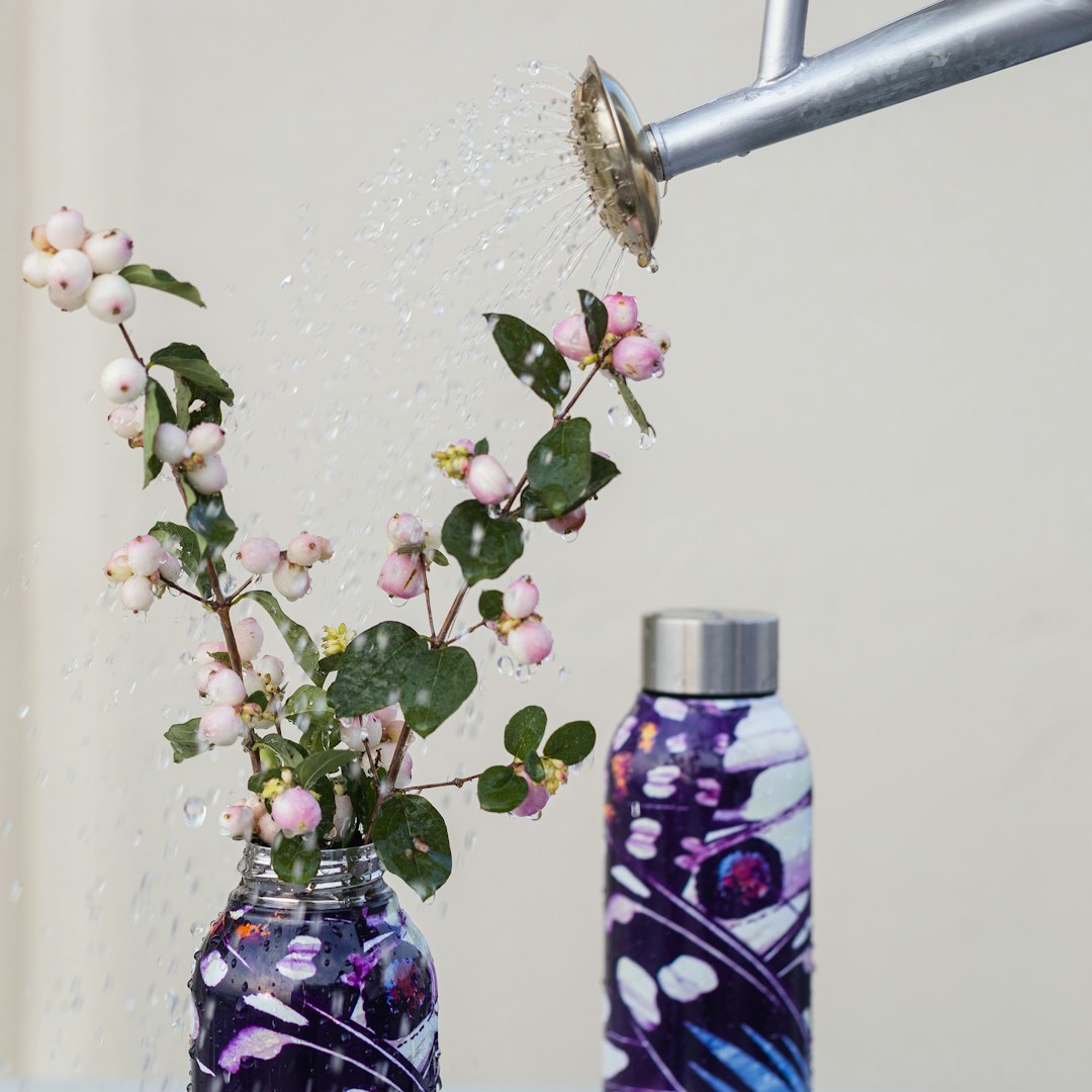 blue and white floral glass bottle