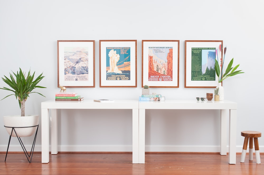 white wooden shelf with picture frames