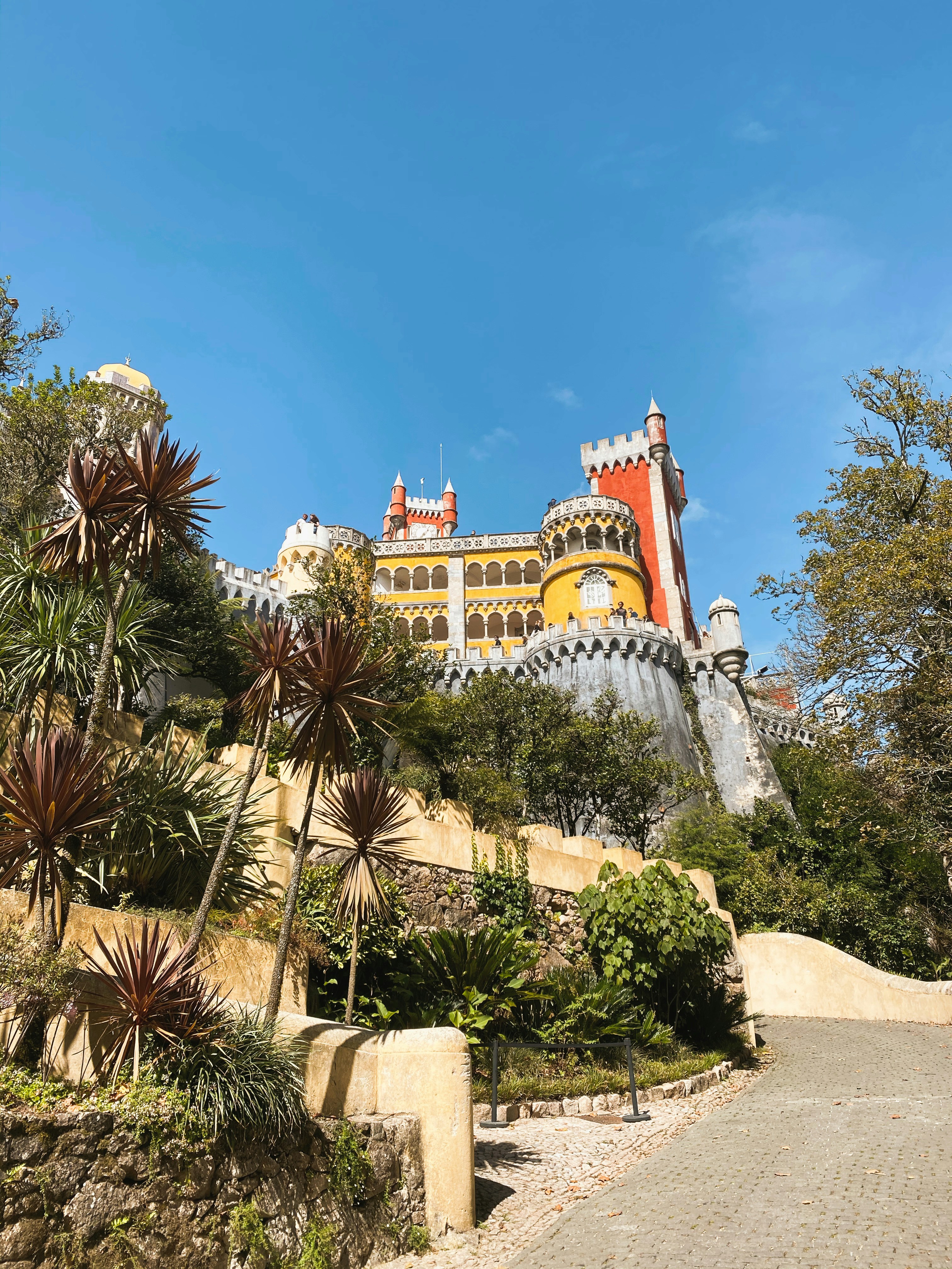 Pena Palace colourful towers on a hilltop in Sintra Portugal