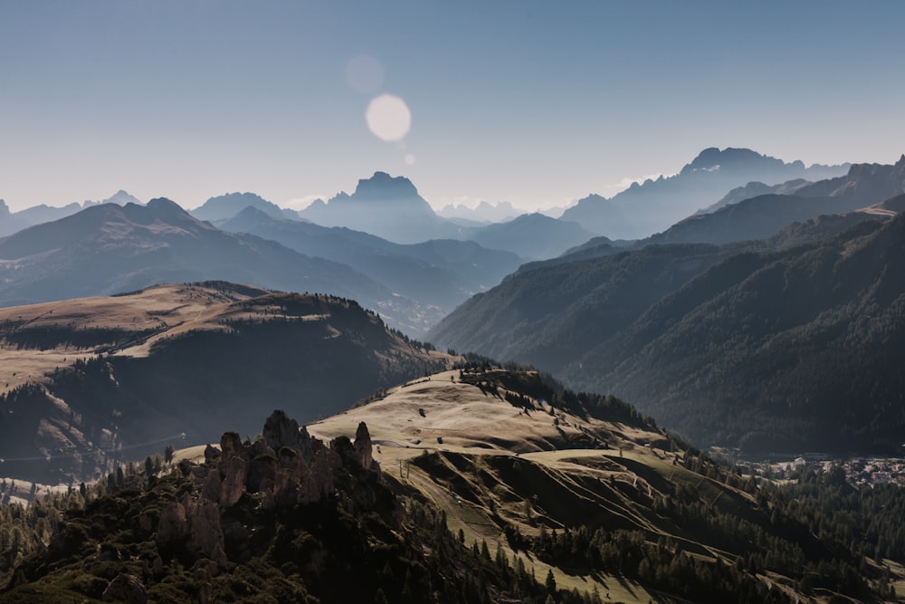 brown and green mountains under blue sky during daytime