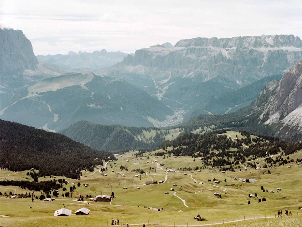 green and brown mountains under white clouds during daytime