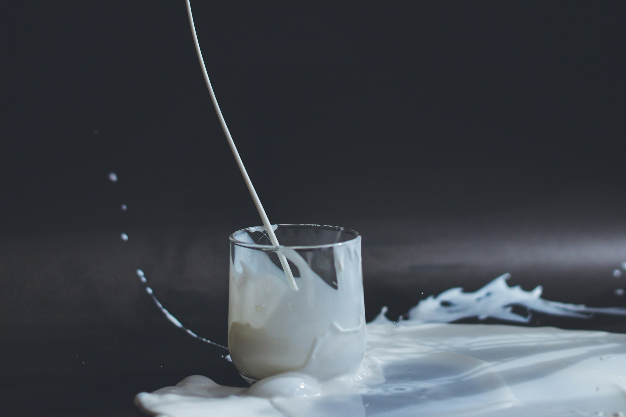 Lactose intolerance causes digestive symptoms and bad flatulence by Anita Jankovic for Unsplash.