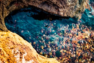 Close-up of smooth quartz surface blending seamlessly with a luxurious spa pool under soft natural light.