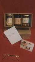 Elegant birthday gift box showcasing colorful chocolates and a heartfelt card.