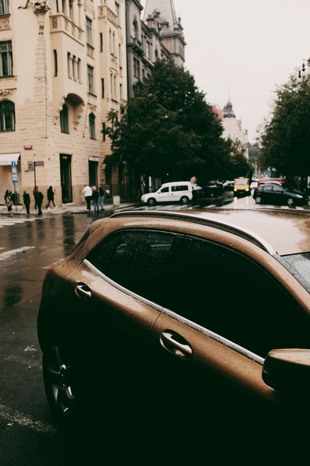 cars parked on side of the road during daytime