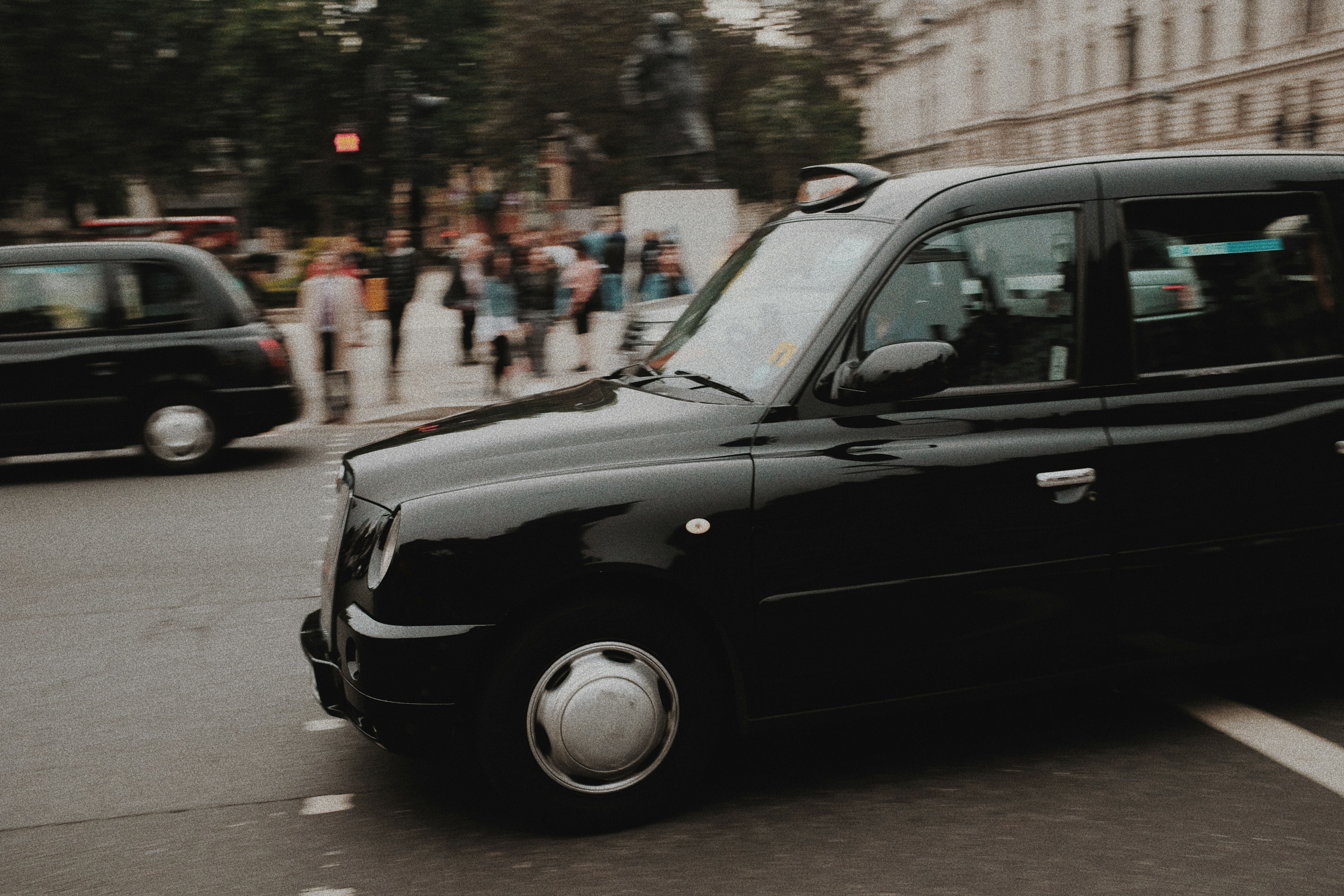 black car on the street during daytime