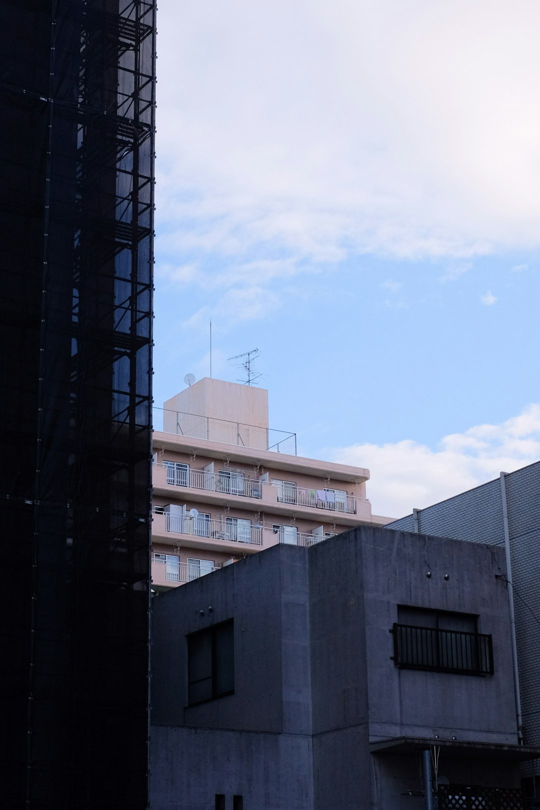 white concrete building under blue sky during daytime