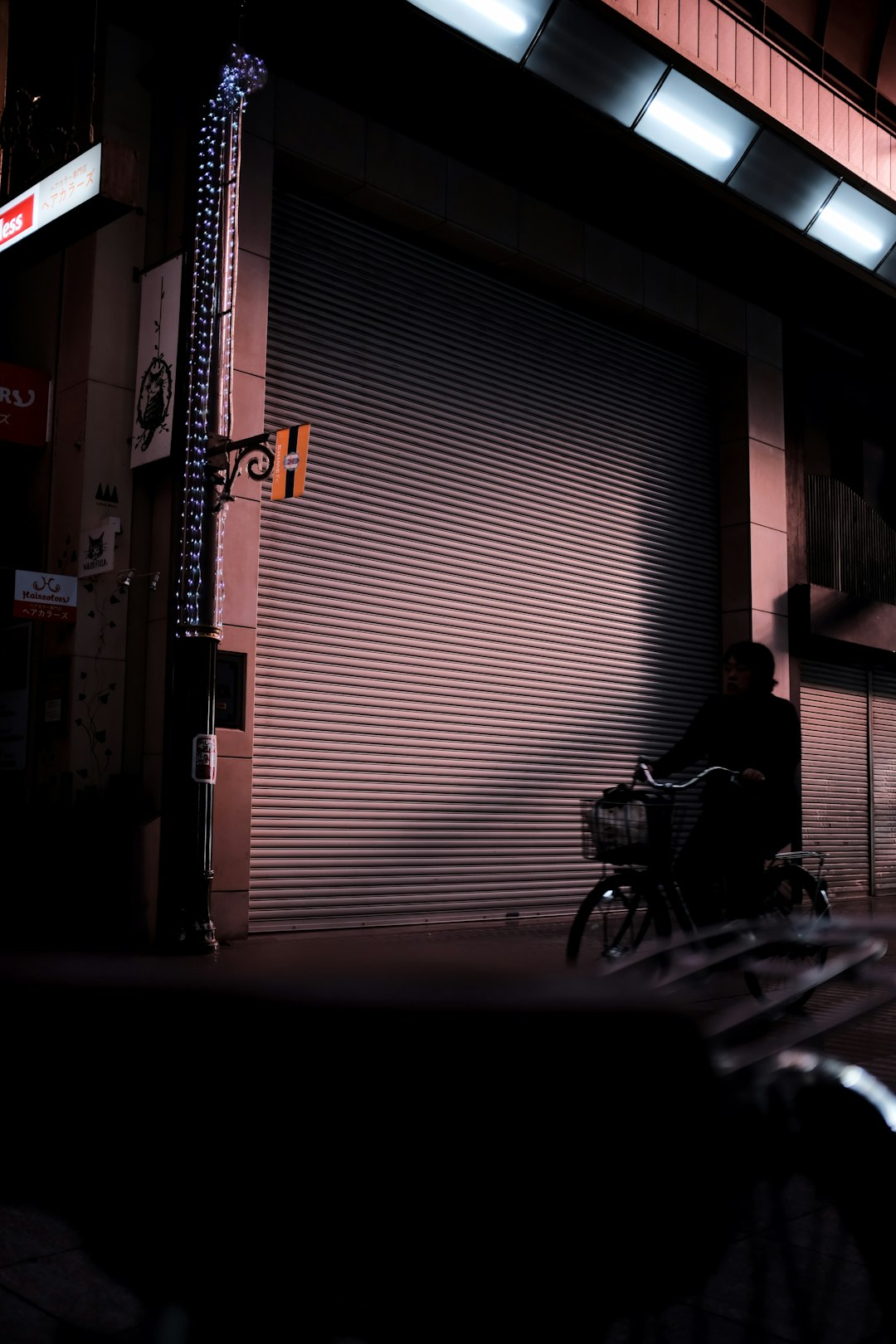 man in black jacket sitting on black wheelchair