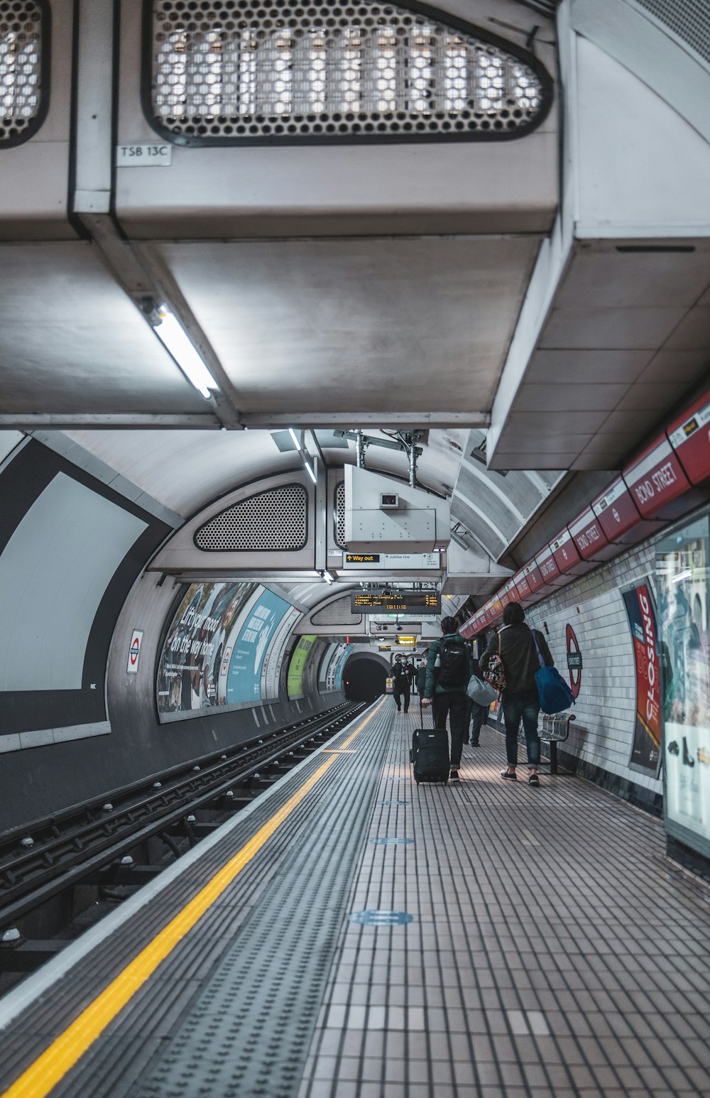 people walking on train station