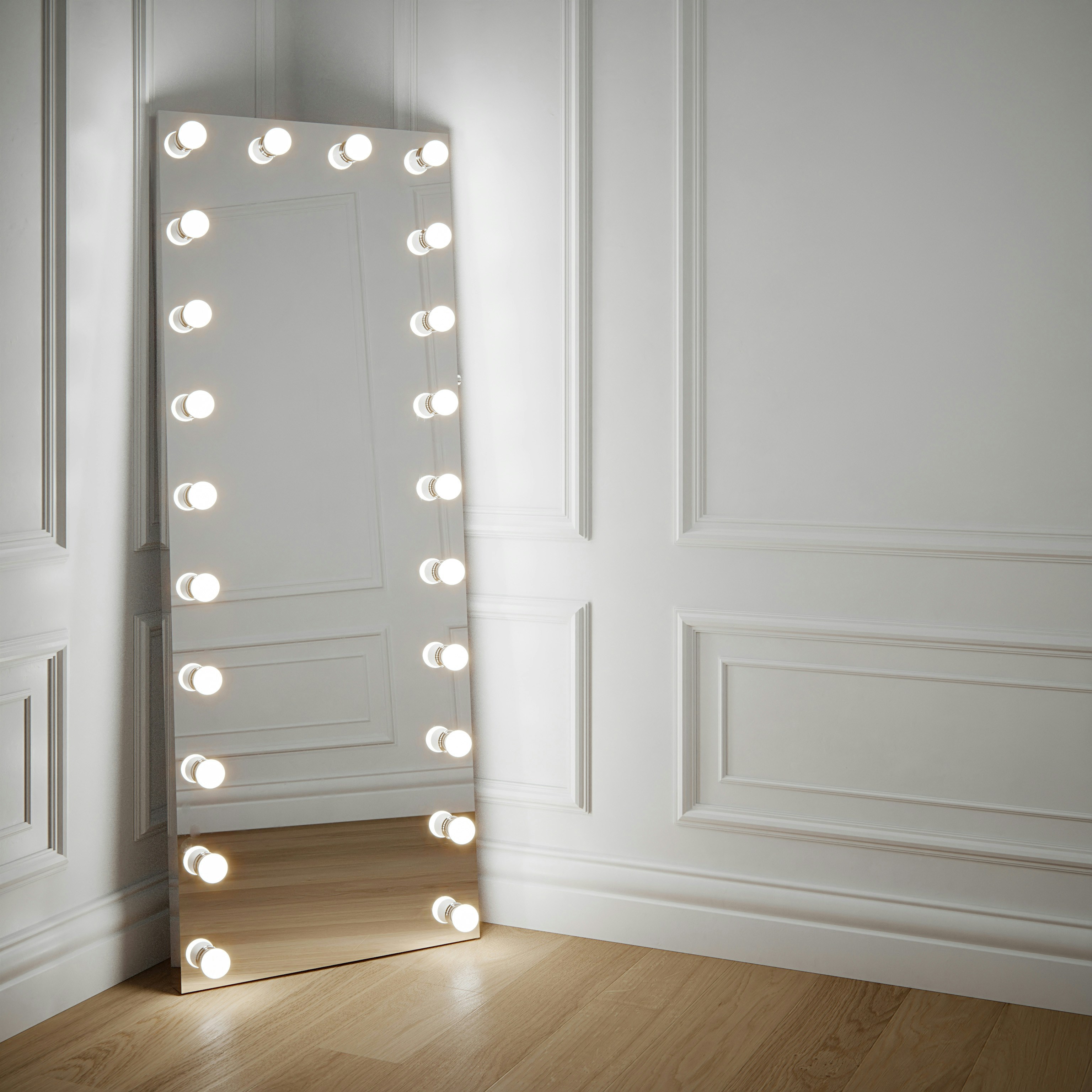 Full length Hollywood mirror with light bulbs

Floor standing and leaning against a panel wall