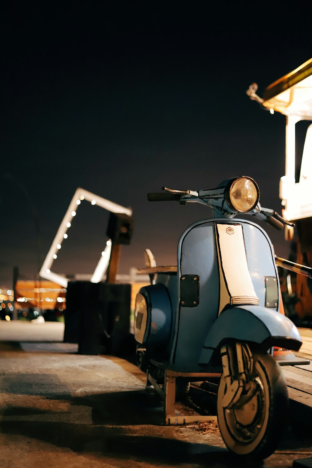 black and white motor scooter