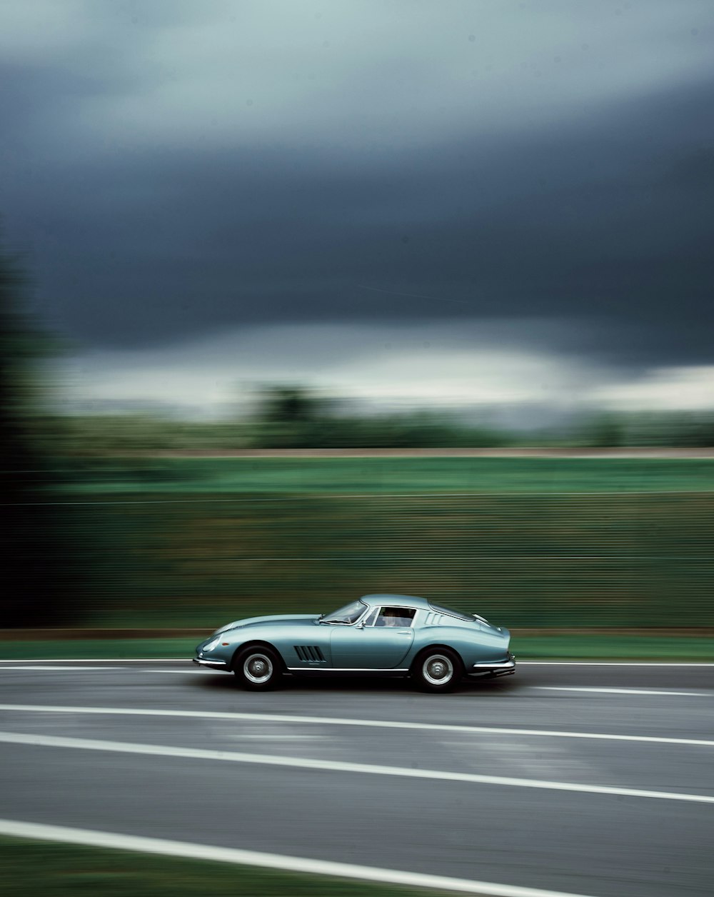 gray porsche 911 on road during daytime