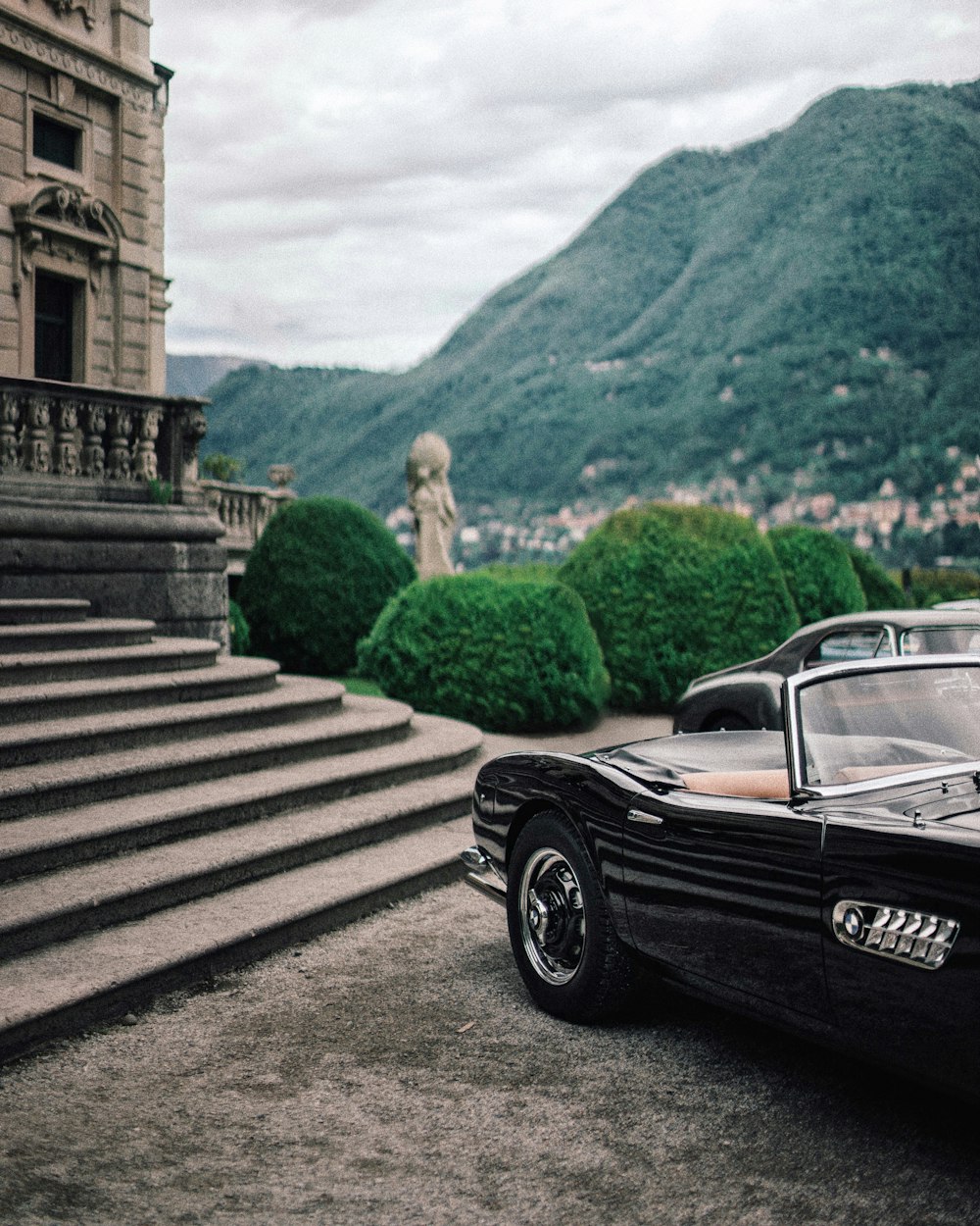 black porsche 911 on stairs