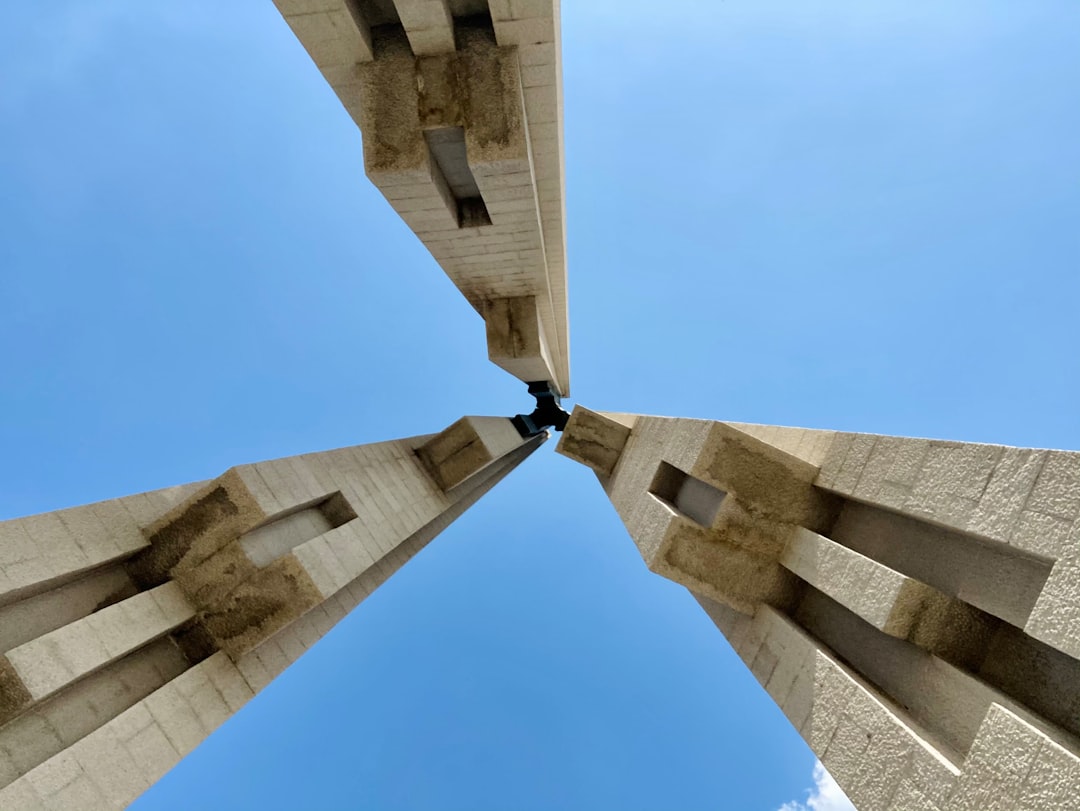 brown concrete building under blue sky during daytime