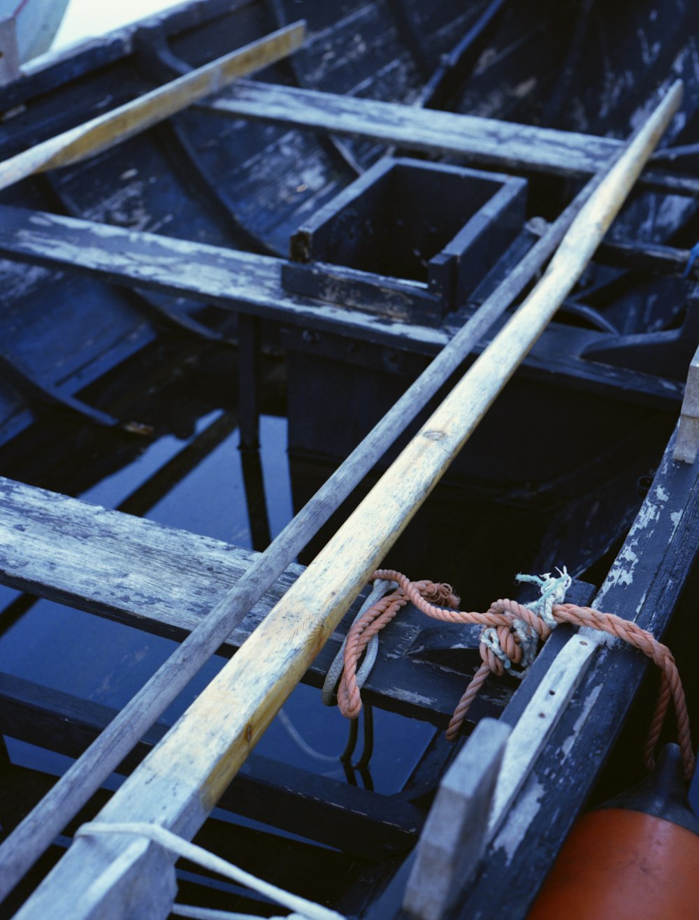 brown rope on black wooden frame