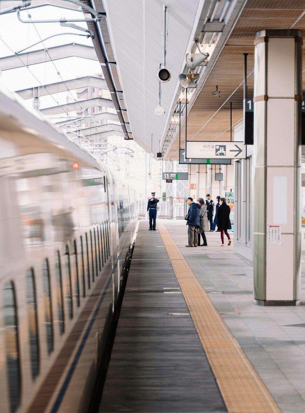 people walking on train station