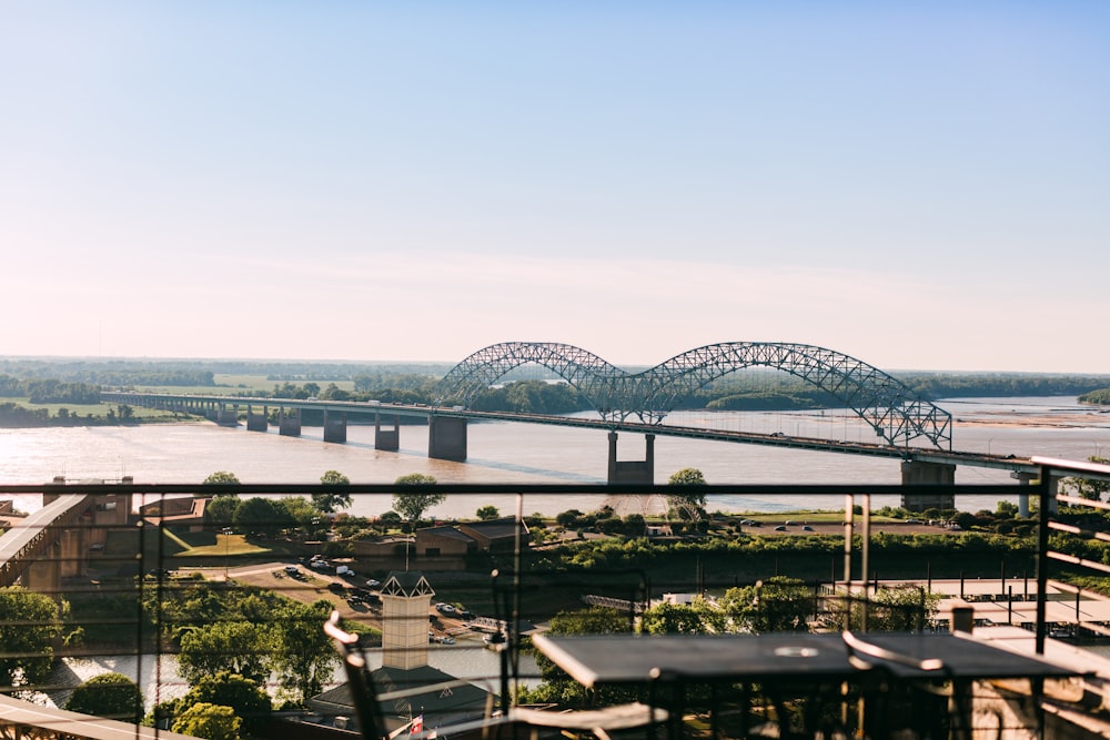 gray metal bridge over the river