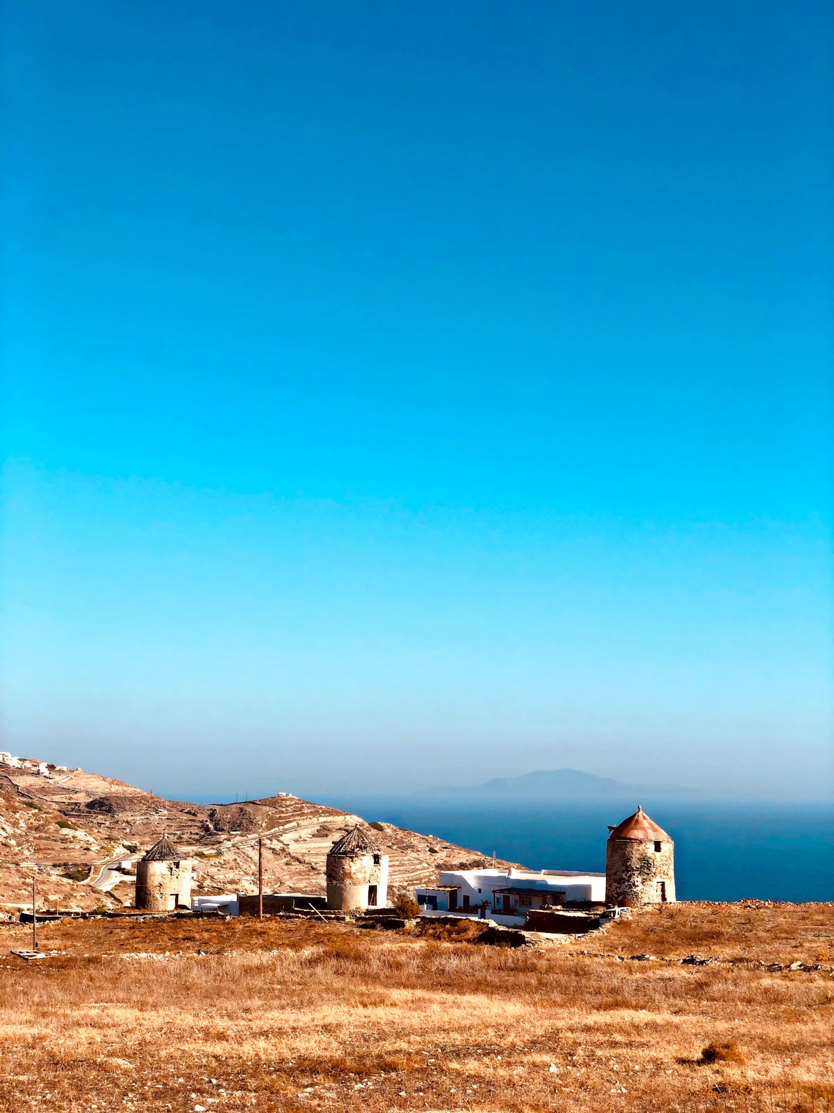 Folegandros — stone houses against the mountain