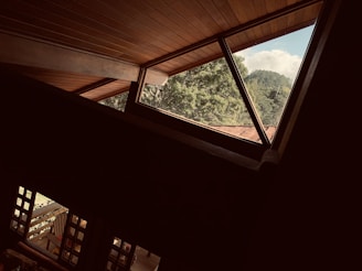 Interior view showing elegant wooden paneling and natural light.