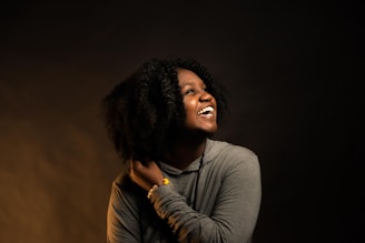 woman in gray long sleeve shirt