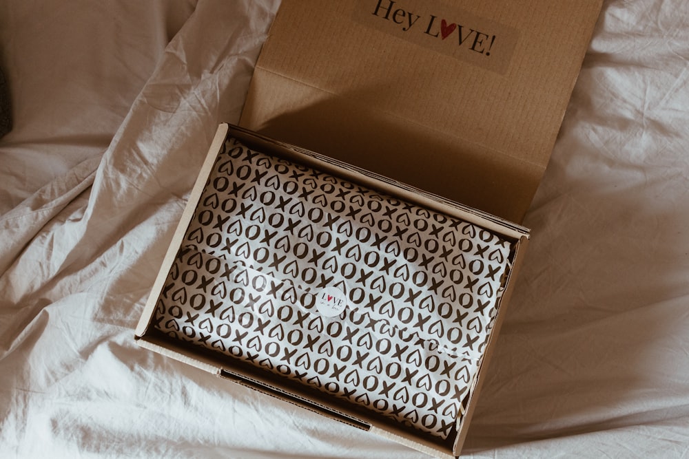 black and white round decor on brown cardboard box