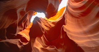 Sunlight casting dramatic shadows on the red sandstone formations in Valley of Fire