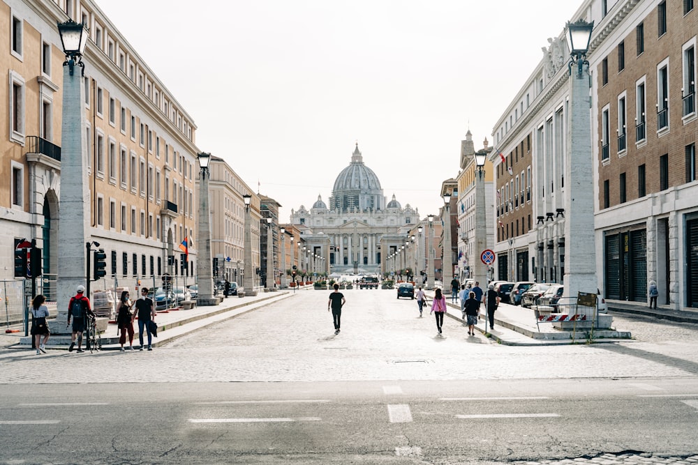 people walking on street near buildings during daytime