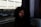 woman in black jacket sitting on white chair