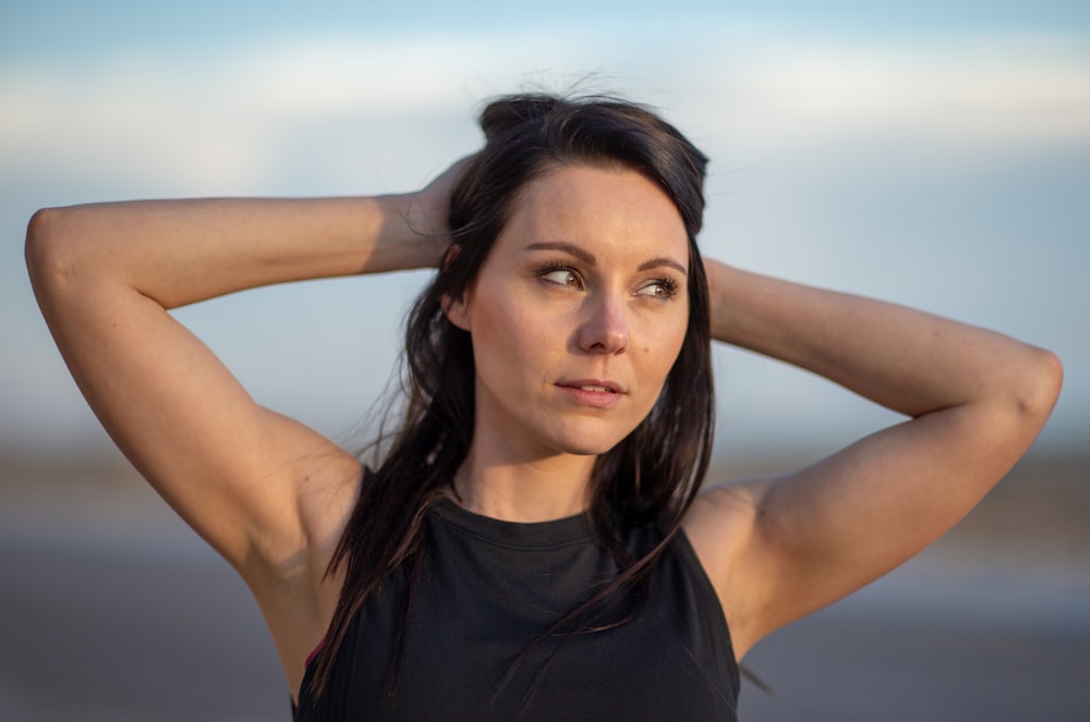 woman in black tank top