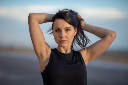 woman in black tank top