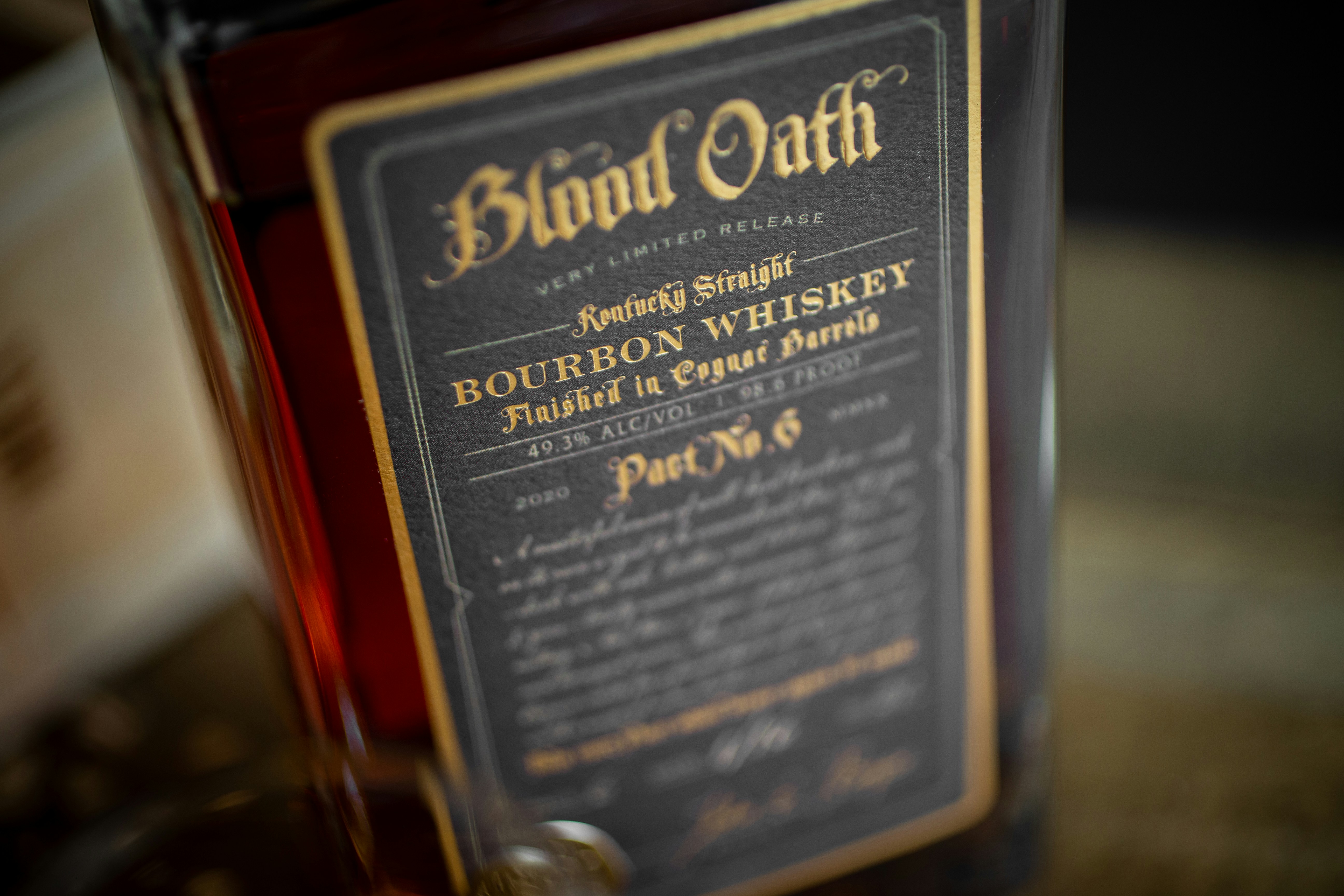 Black and gold label bottle photo Free Grey Image on Unsplash