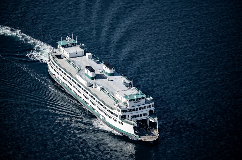 white and black ship on sea during daytime