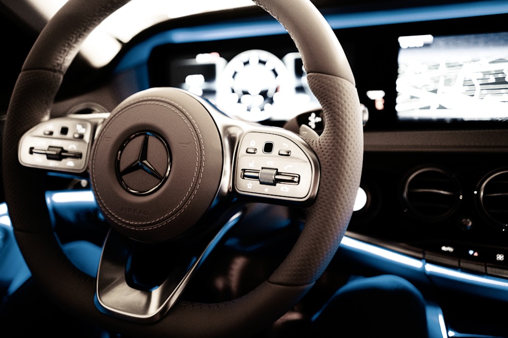 black and silver steering wheel