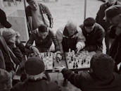 A tense moment captured during a community chess tournament with focused players.