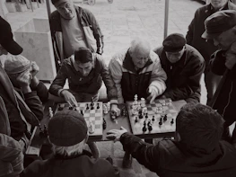 A tense moment captured during a community chess tournament with focused players.