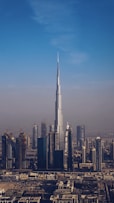 city skyline under blue sky during daytime