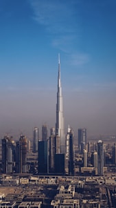 city skyline under blue sky during daytime