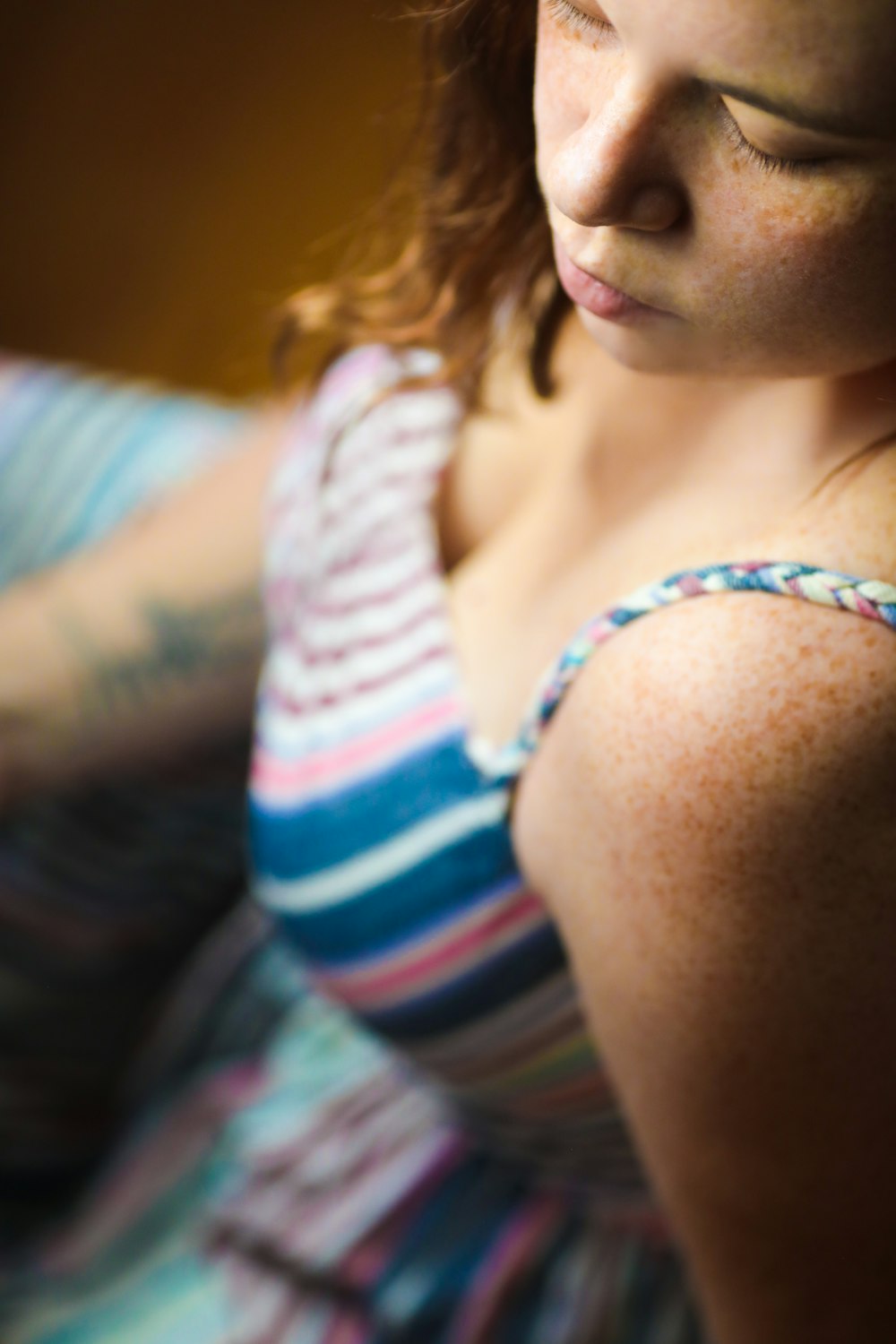 woman in white blue and red tank top