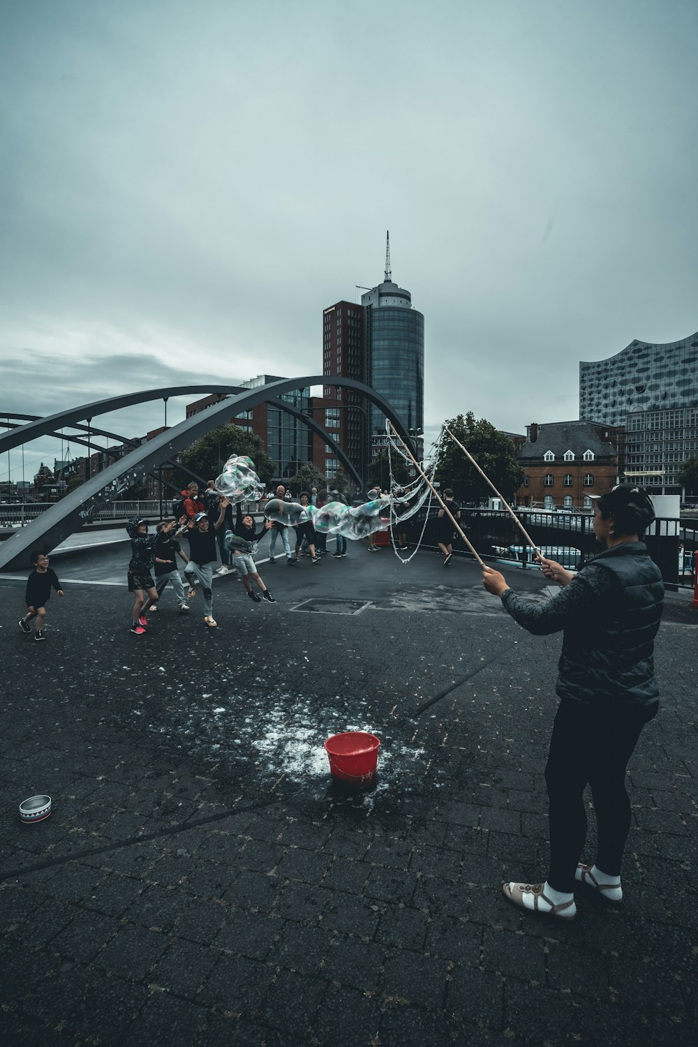 people walking on street with water droplets during daytime