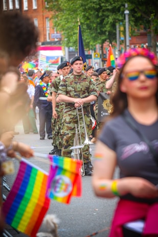 A vibrant parade event showcasing veterans marching proudly with flags and medals.
