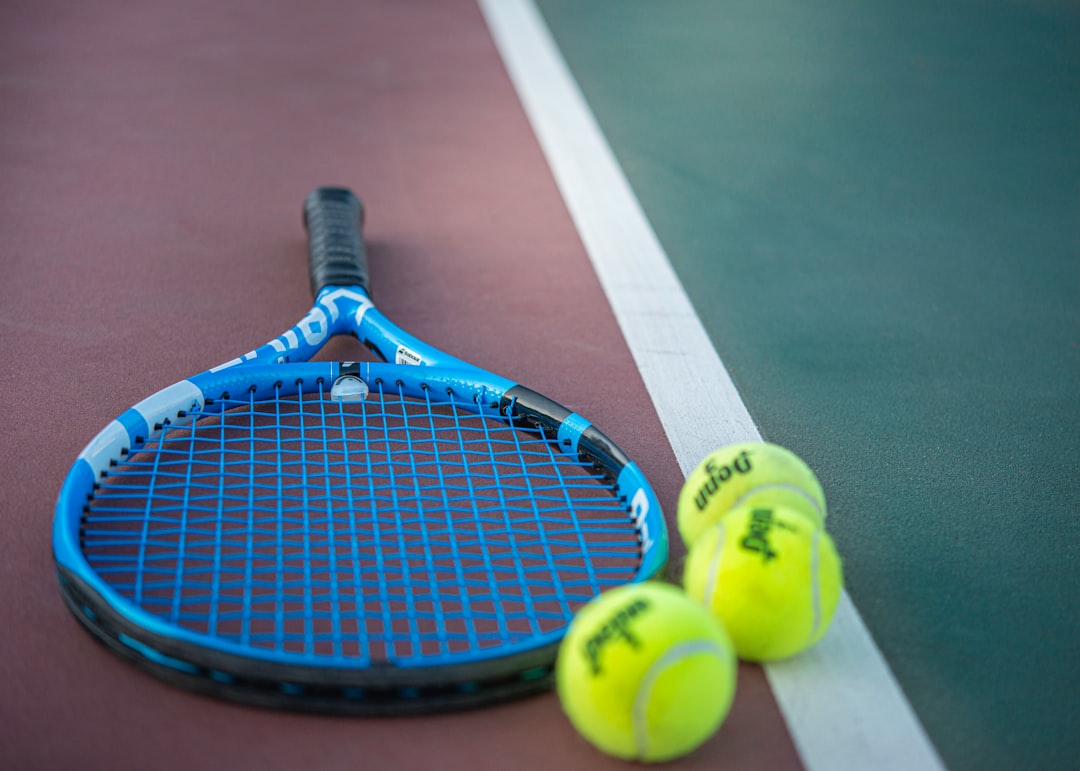 Tennis racquet and balls.