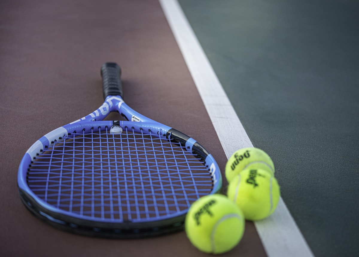 Tennis racquets on court