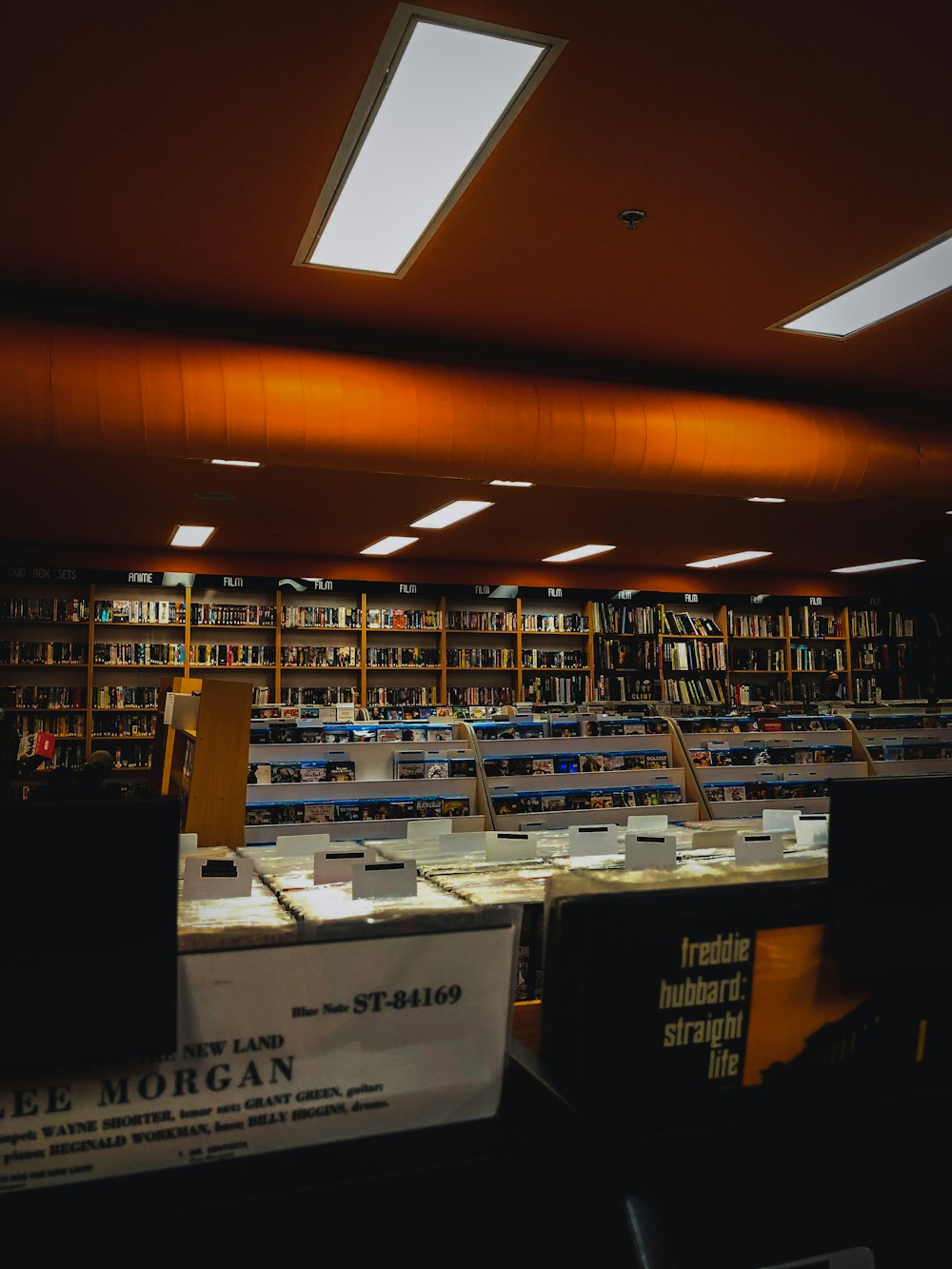 books on shelves in library