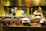 Artisan preparing ginguba-based dishes in a cozy kitchen setting.