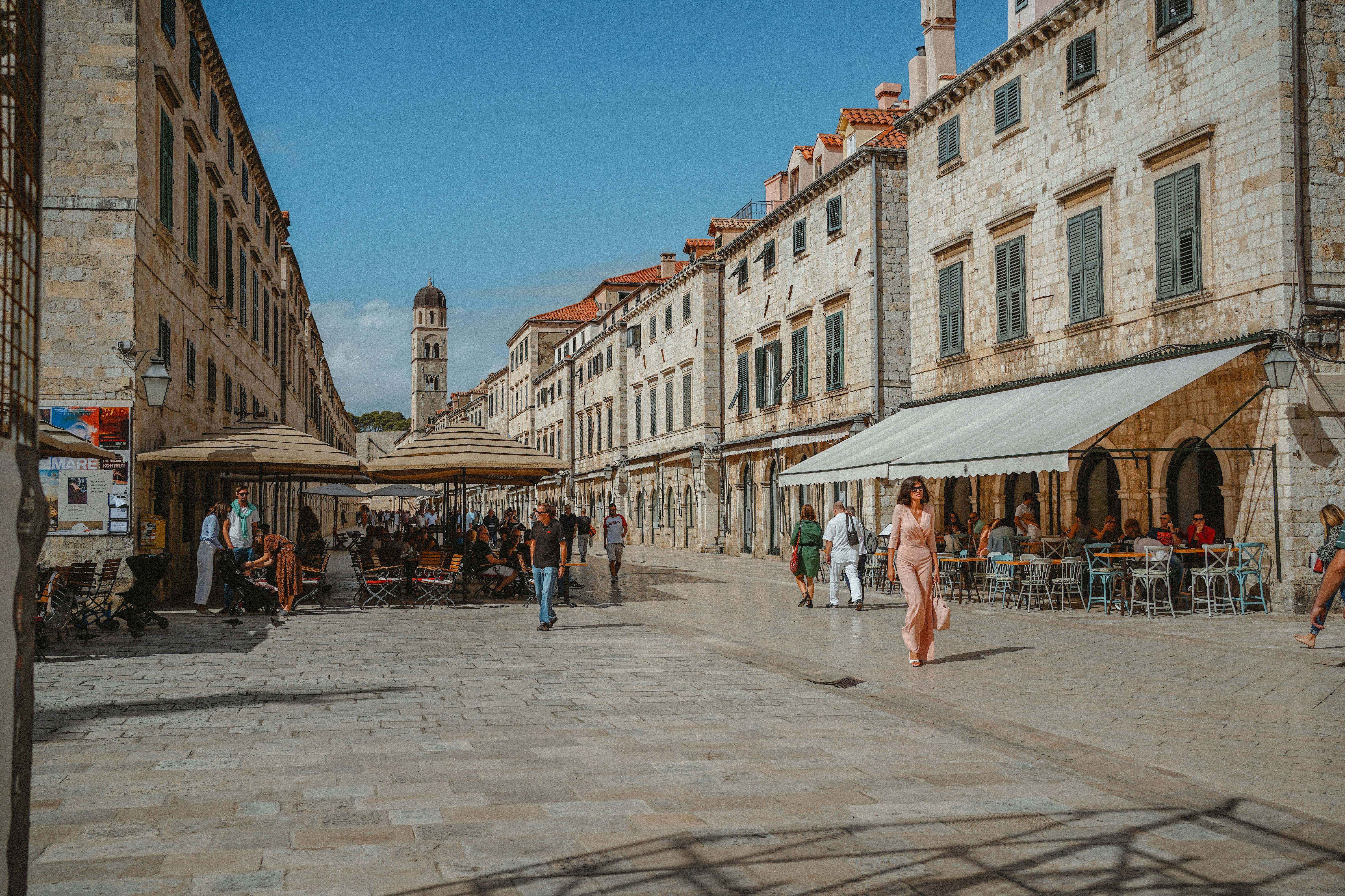 people walking on street near building during daytime