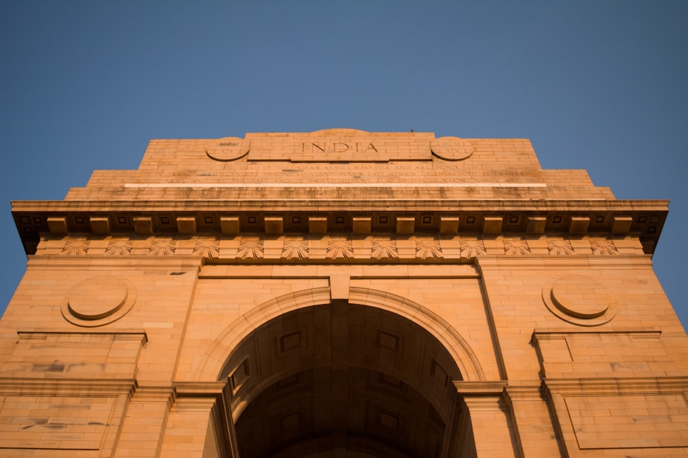 brown concrete building under blue sky during daytime