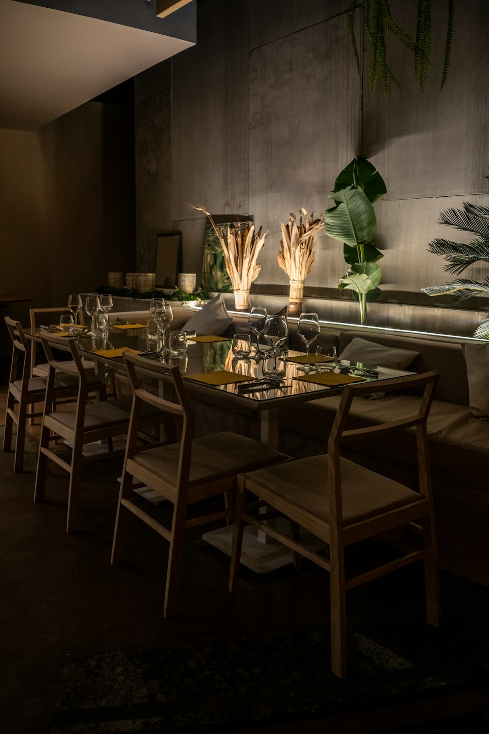 brown wooden table with chairs