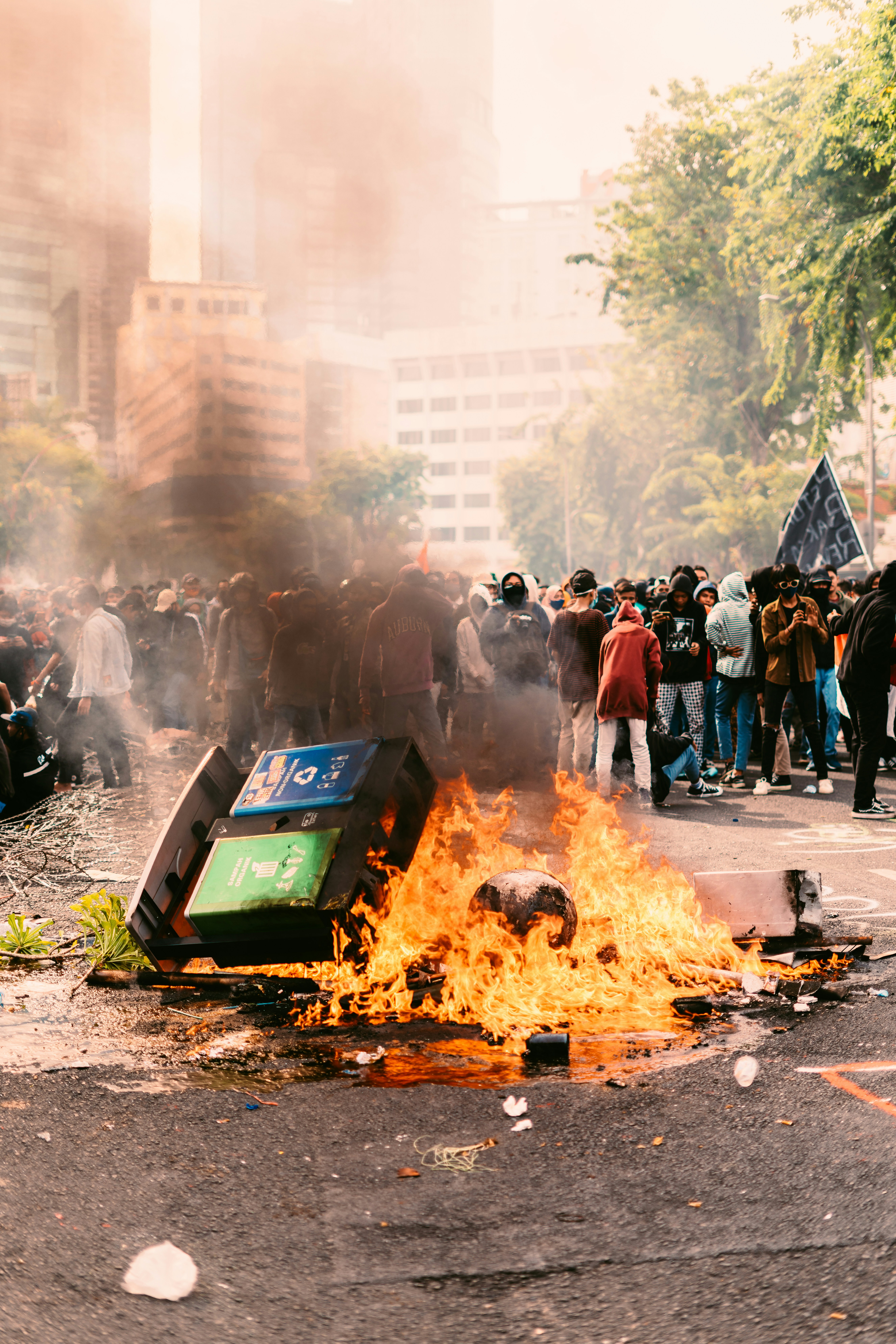 people standing near bonfire during daytime