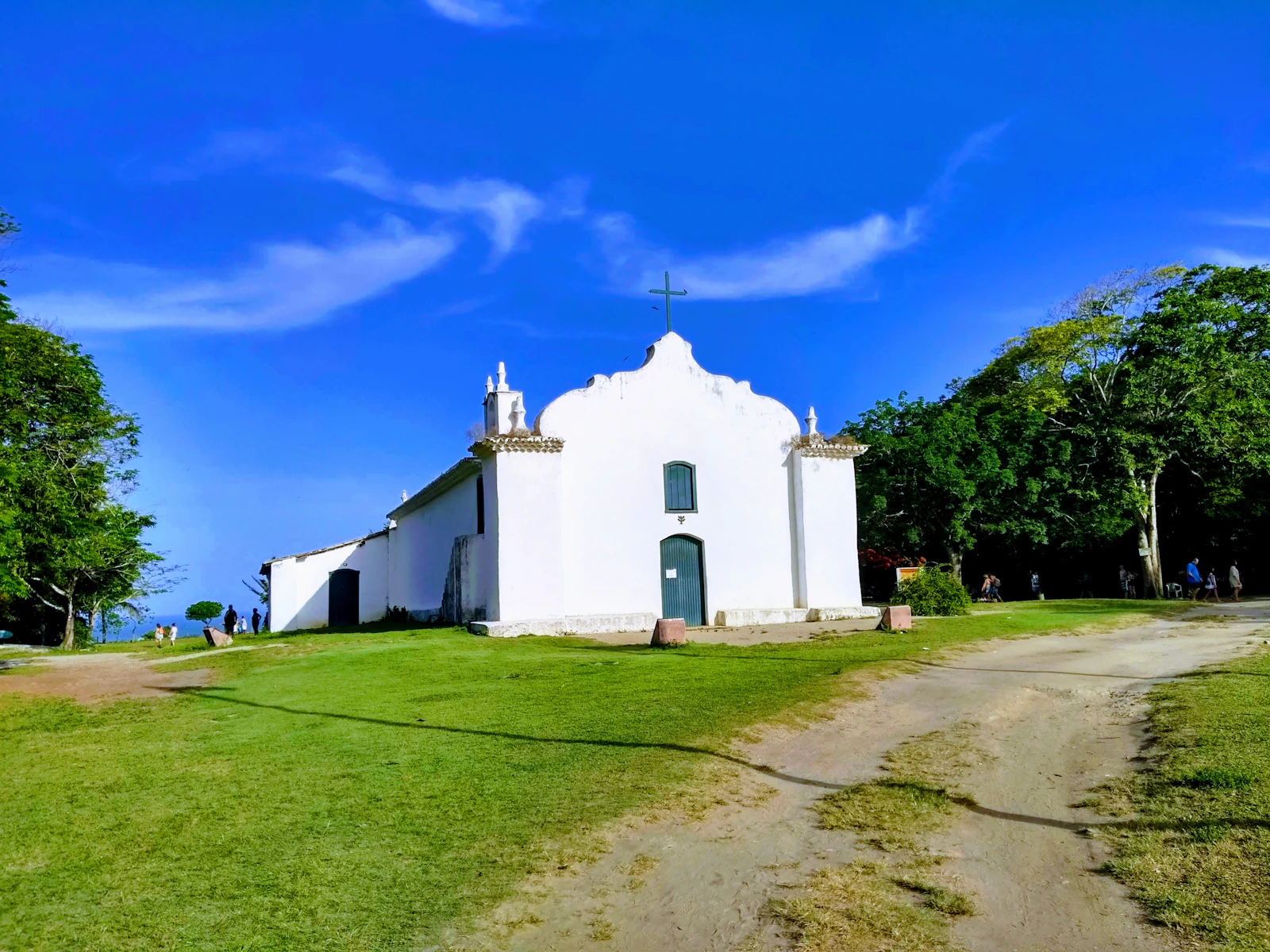 The white church and Quadrado square in Trancoso under a blue sky
